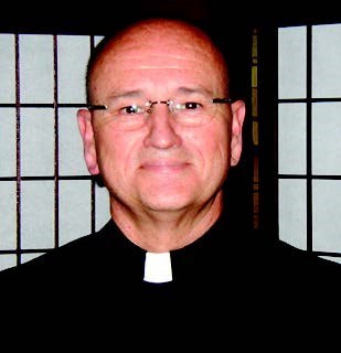 Obituary of Fr. Robert J. Powell