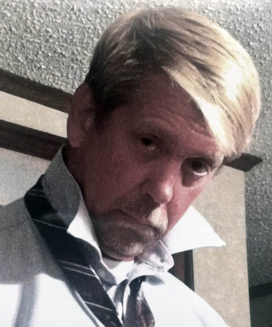 Obituary of John P. McGrew