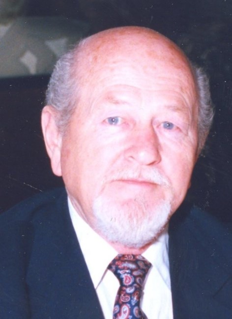 Obituary of Norman E. Mann