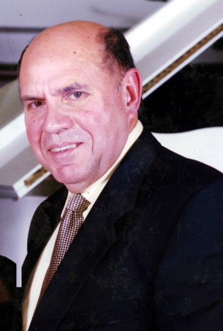 Obituary of Carlos A Dominguez