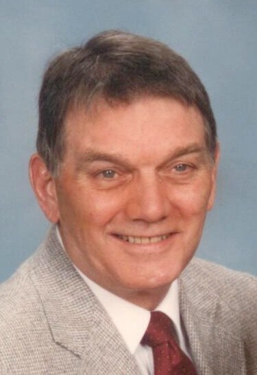 Obituary of Justin E. Wolstenholm