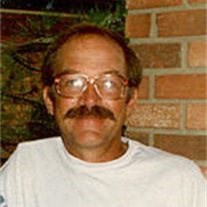 Obituary of Roger L Woods