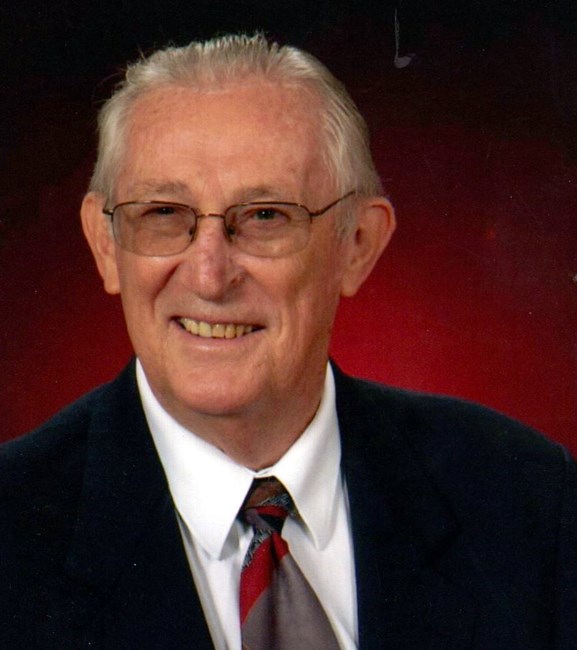 Obituary of John T Hughes