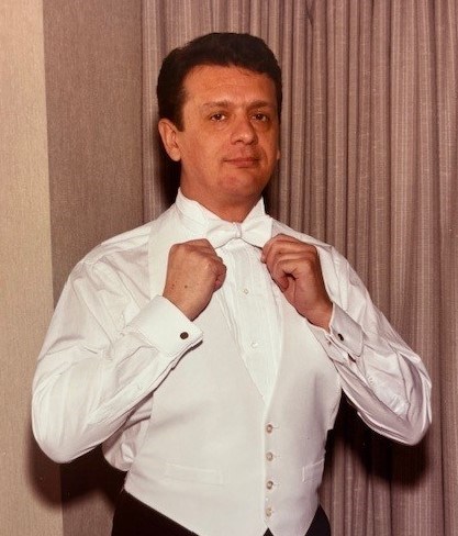 Obituario de Carlos A. Guerrero