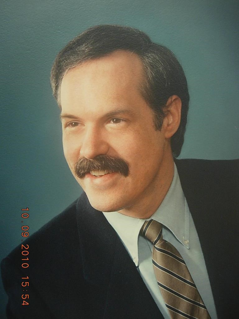 Obituary of Dr. Michael E. Longevin