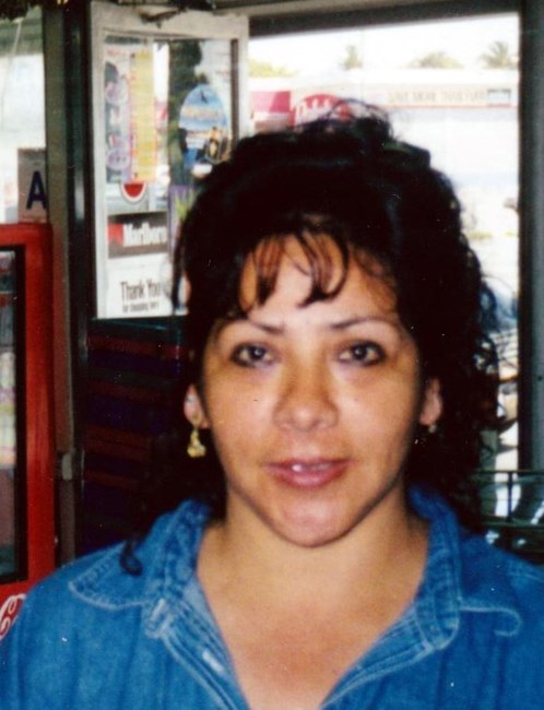 Obituary of Maria Teresa Camacho Guzman