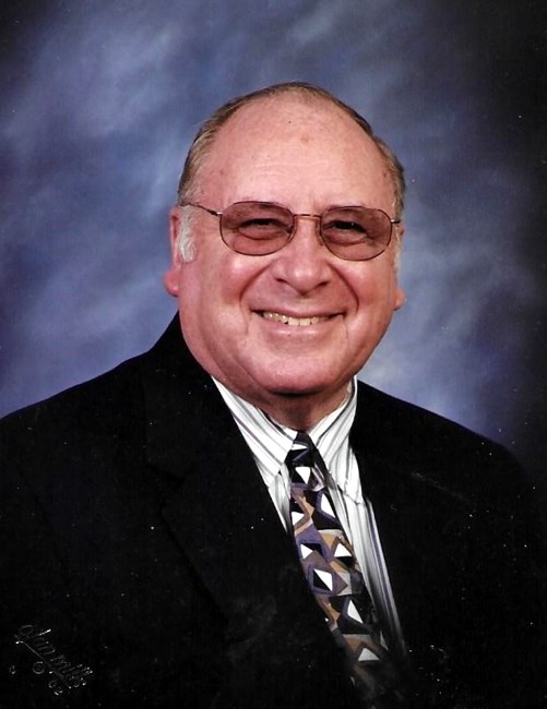 Obituario de David E. Russell