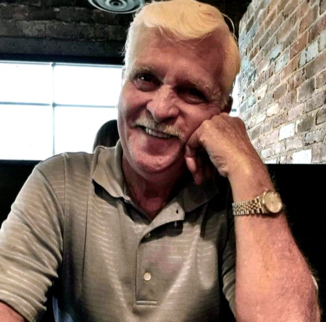 Obituary of Thomas E. Hughes