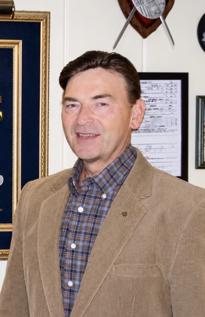 Obituary of John E. Novak