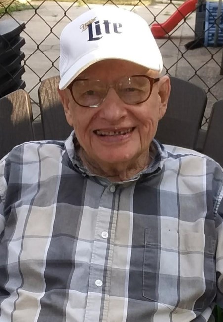 Obituary of John E Dixon