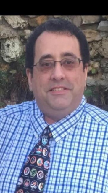 Obituary of Sanford "Sandy" Atkins