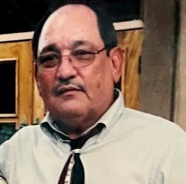 Obituary of Henry C Holguin
