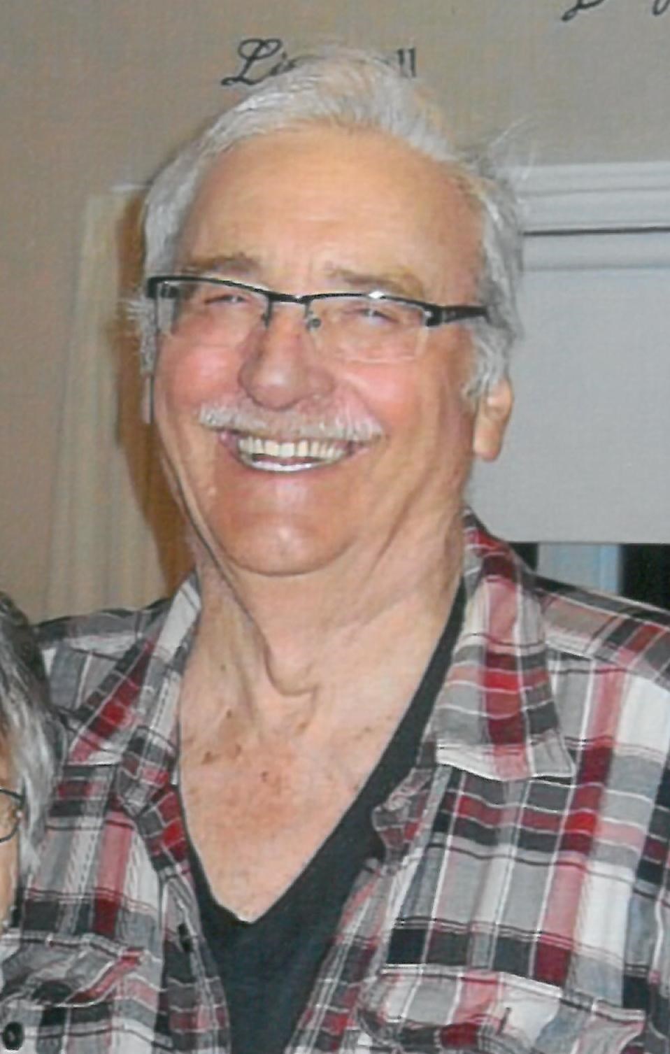 Obituary of Reginald "Reggie" Doucet