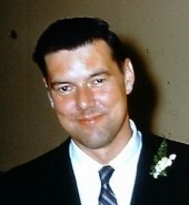 Obituary of Edwin J. Spellman