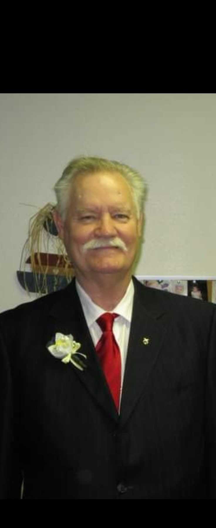 Avis de décès de John E. Parry