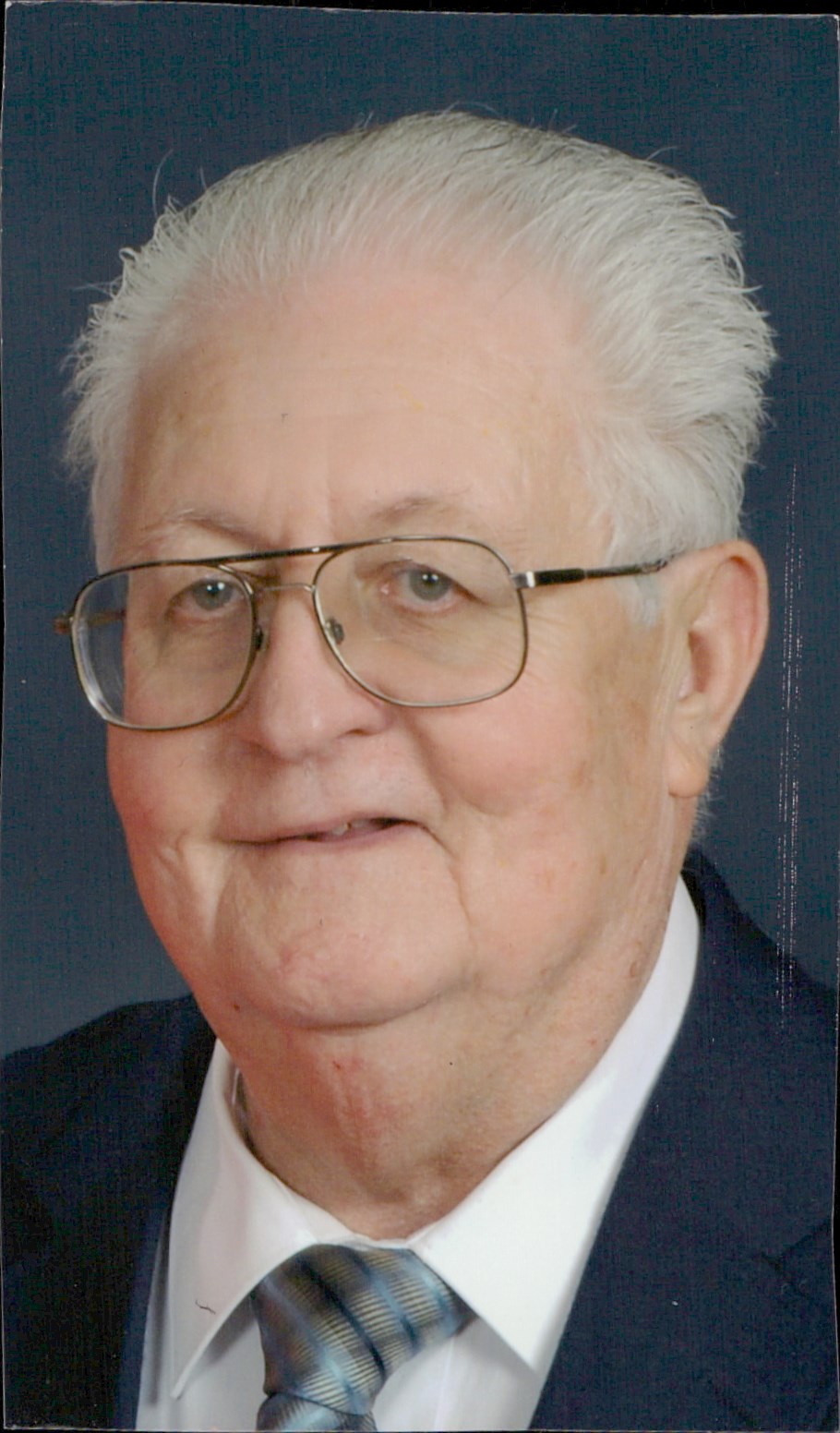 Obituario de John Albert Tracy Jr.