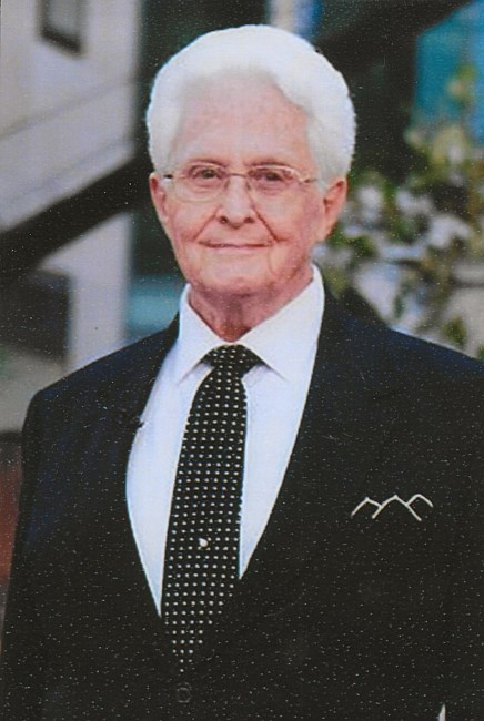 Obituario de Dr. James Edward Hampton