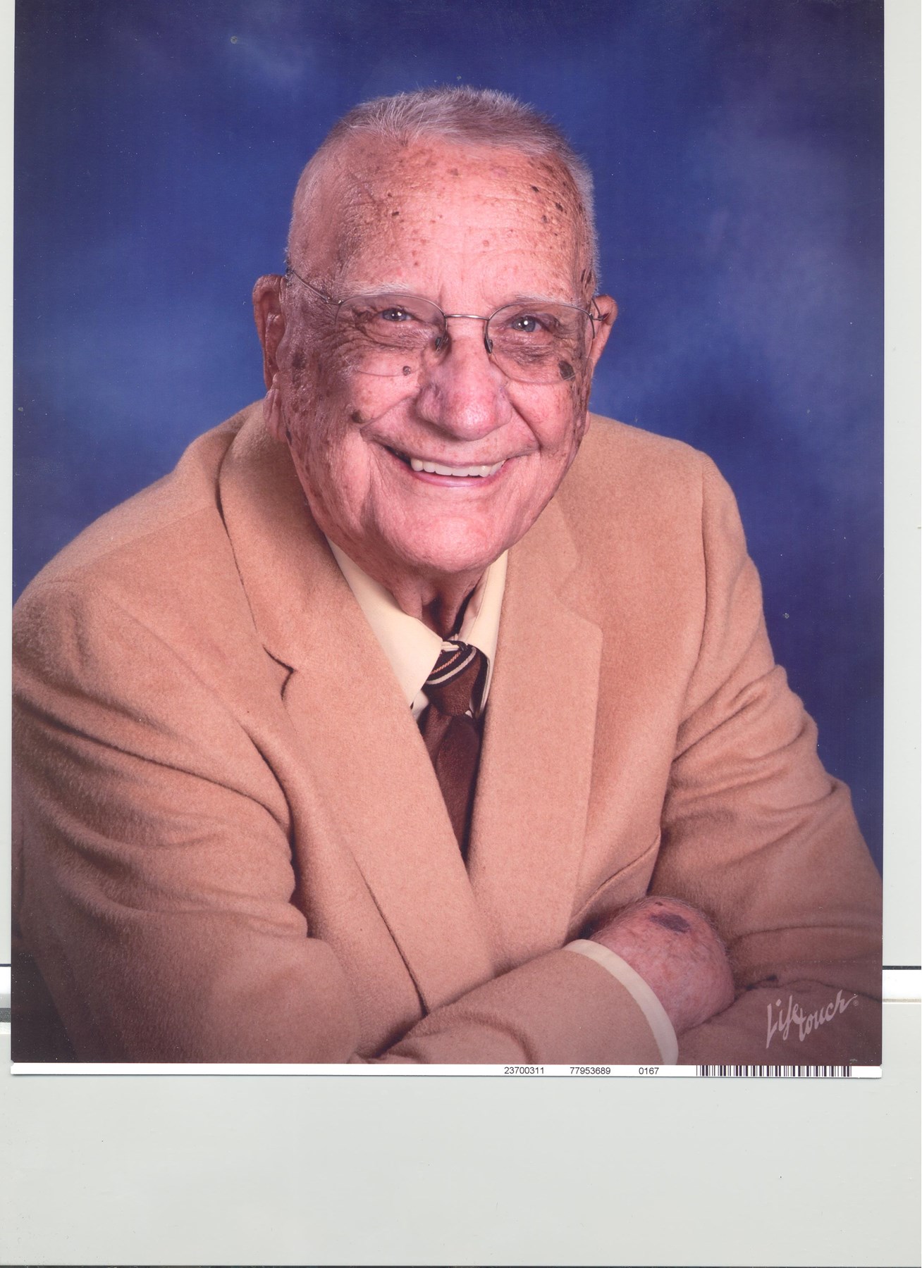 Obituary of John E Rutherford