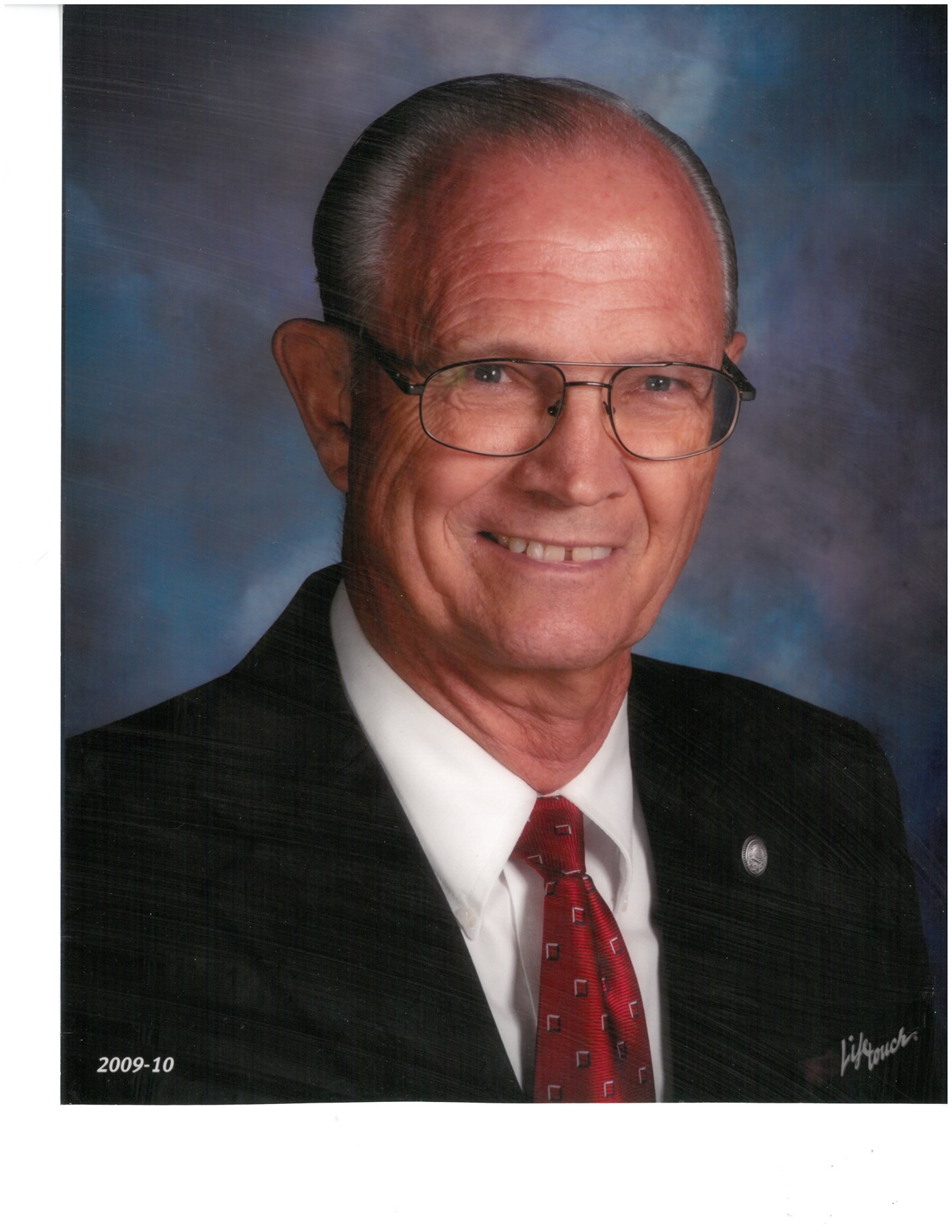 Obituary of Richard J Russell