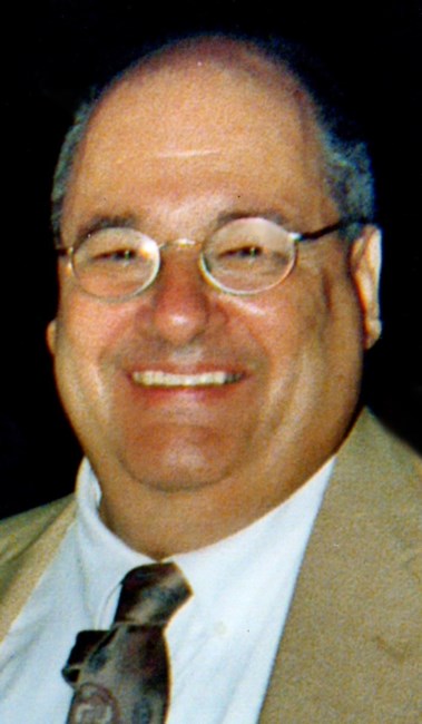 Obituary of John E. Foster