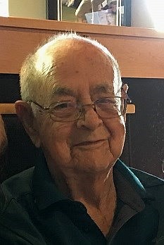 Obituary of Raymond W. Mooney