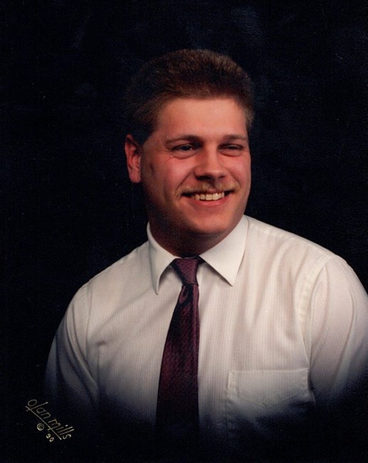 Obituary of John Warren Gundelach