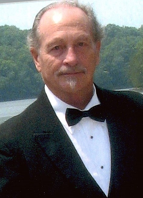 Obituary of James C. Rollins