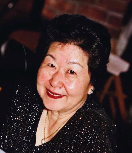 Obituary of Kim Lan Woo