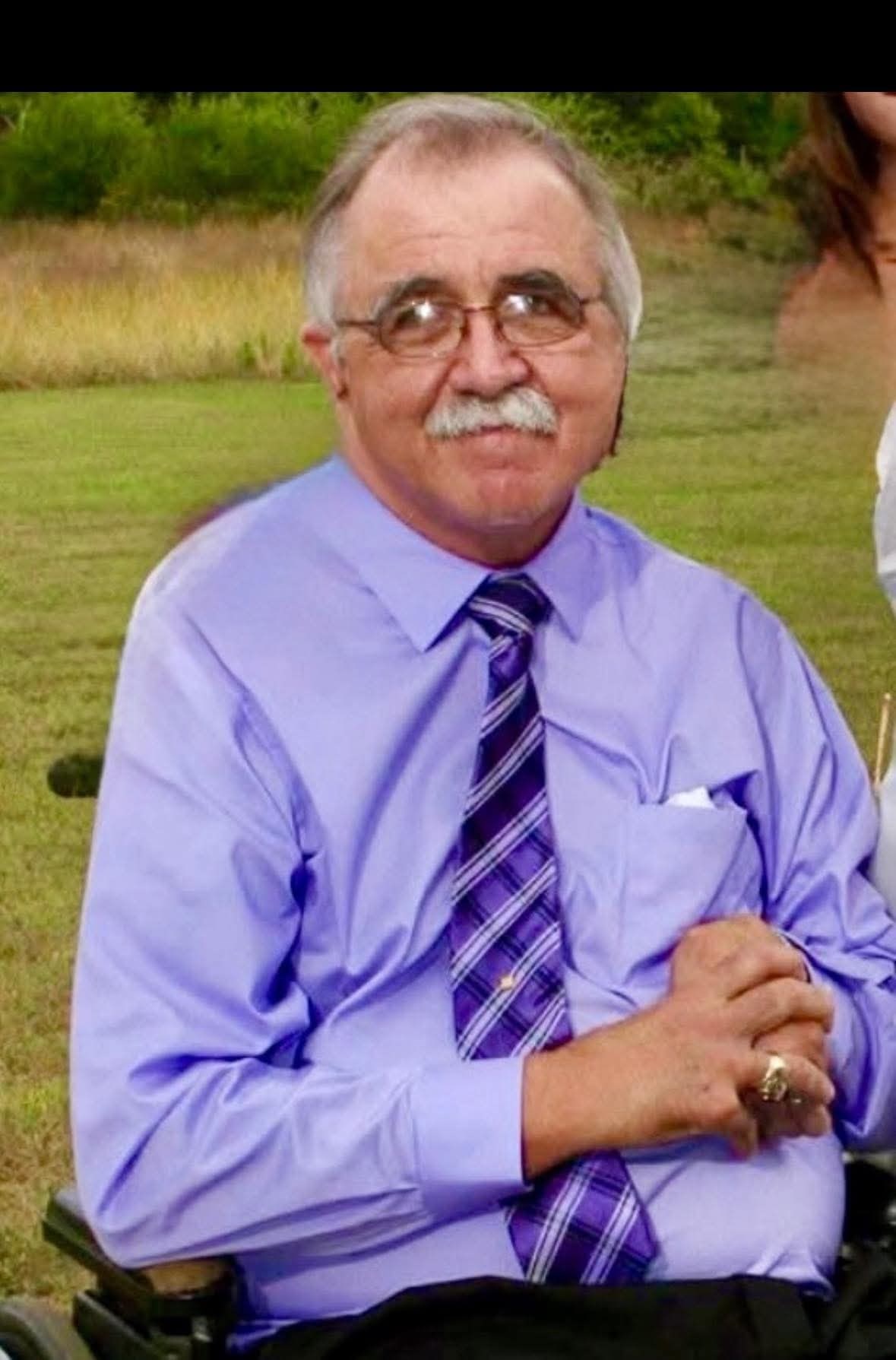 Obituary of John L Robinson