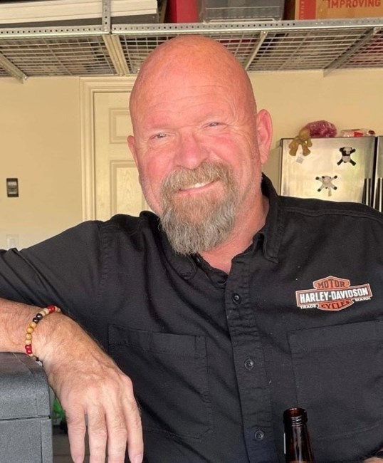 Obituary of James Michael Rhodes