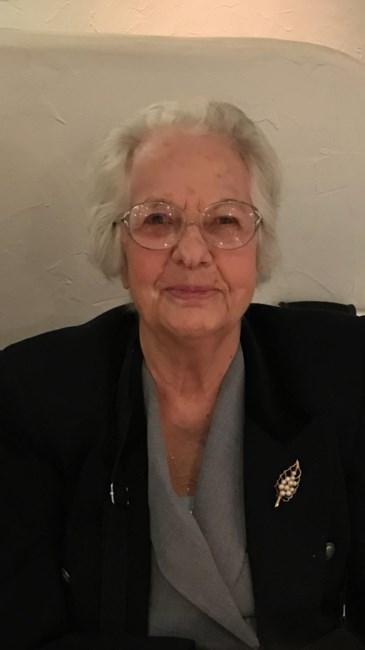 Obituario de Evangelia Peter Heon