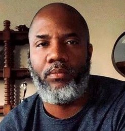 Obituary of John Holden