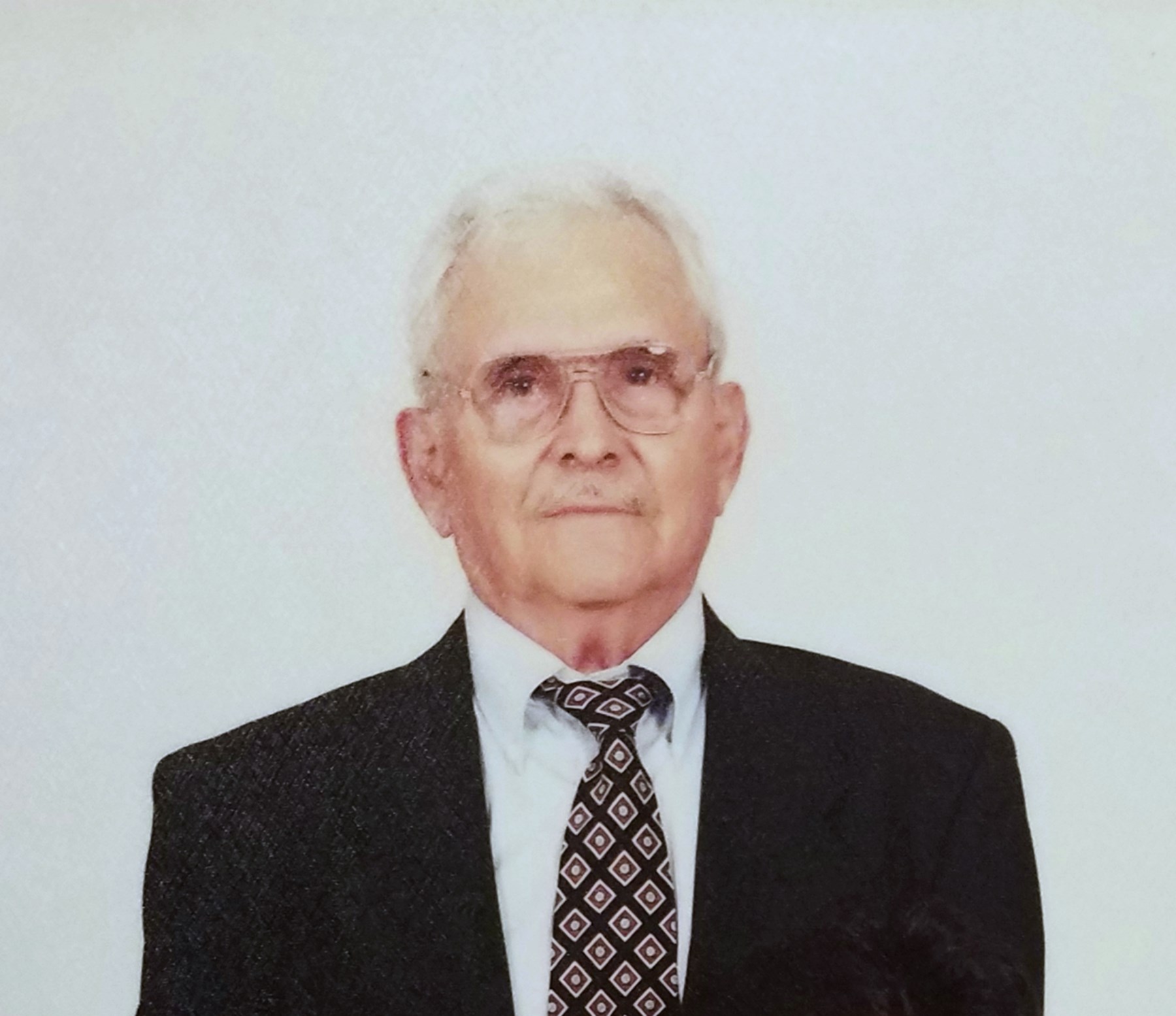 Obituary of Ausencio H. Hinojosa