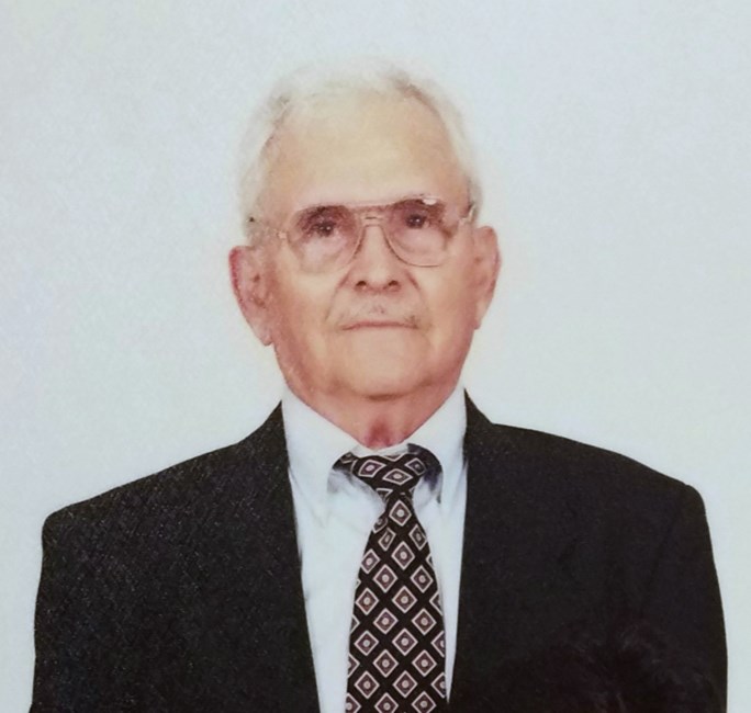 Obituary of Ausencio H. Hinojosa