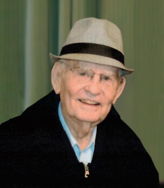 Obituario de Charles E. Caho