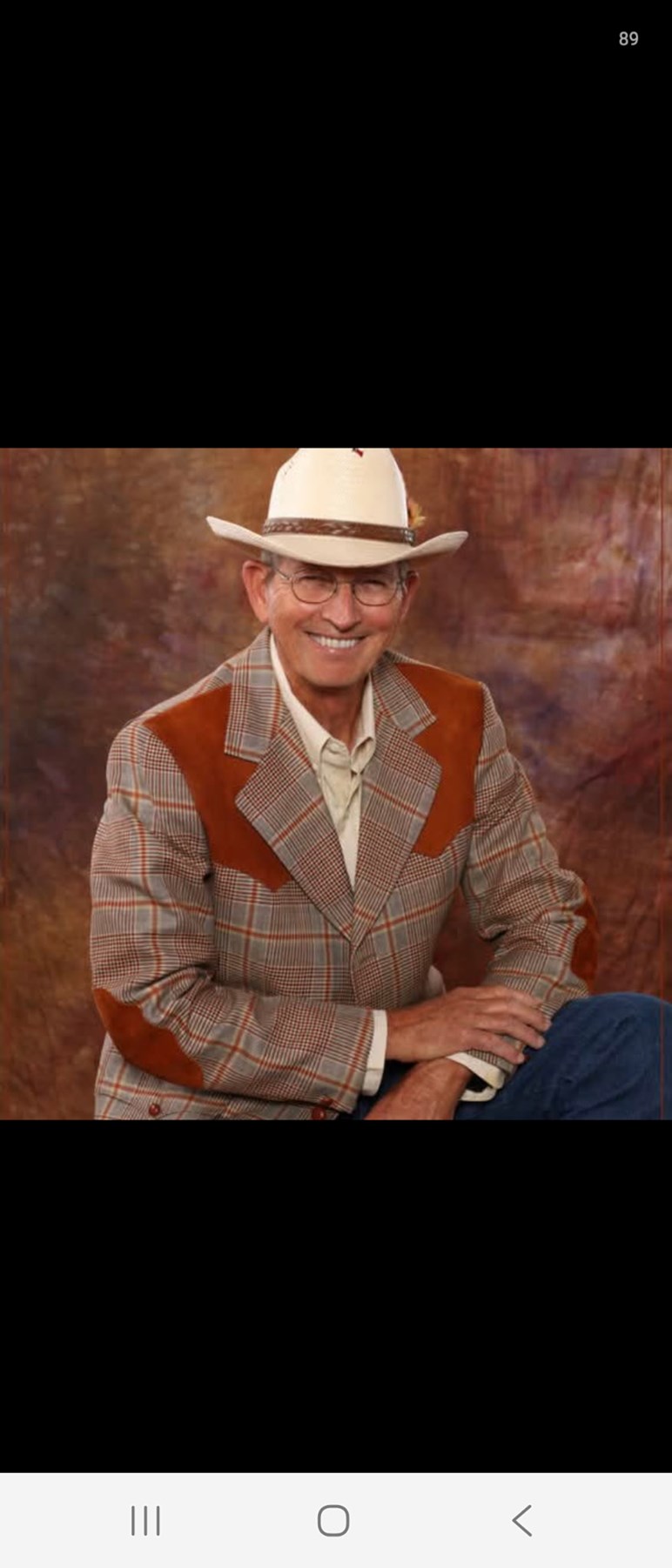 Obituary of Ned L Rhoades