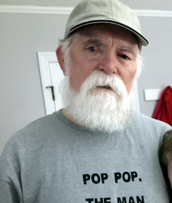 Obituario de George F. Woolls