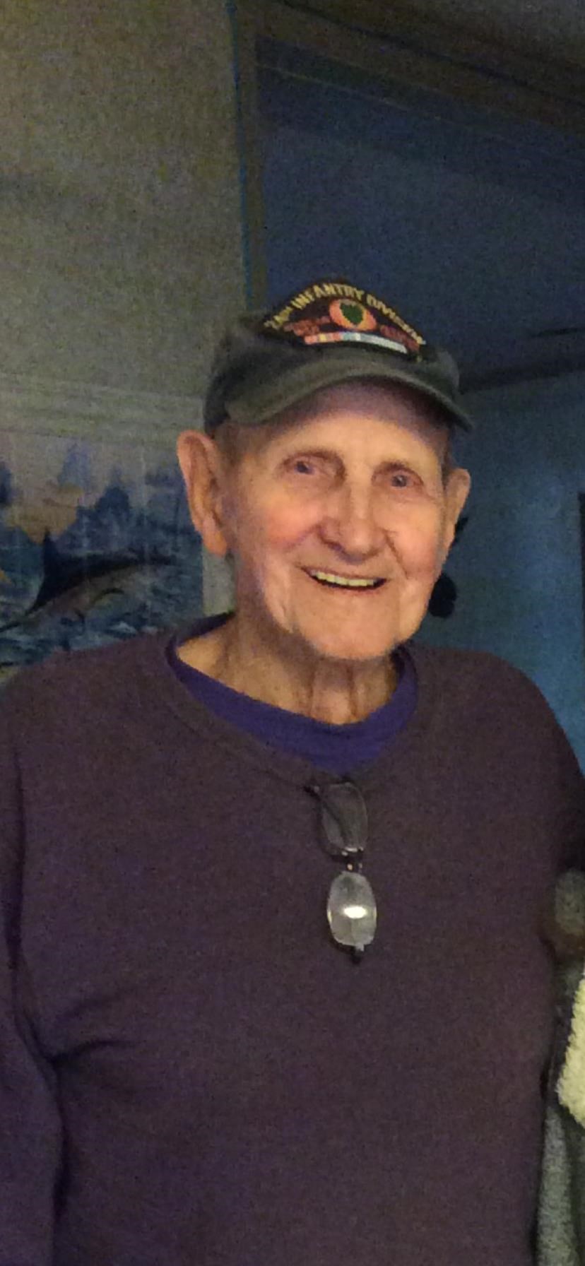 Obituary of Russell George Rhodes