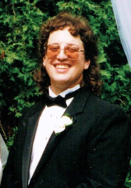 Obituario de John E. Flood