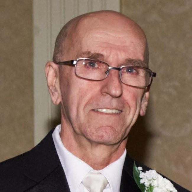 Obituary of Dennis Russell