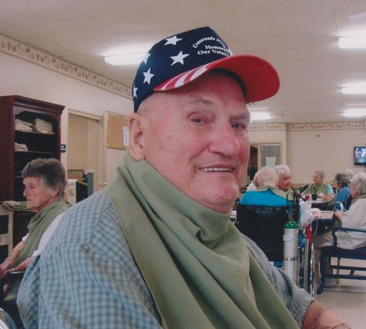 Obituary of Glen E. Holcomb