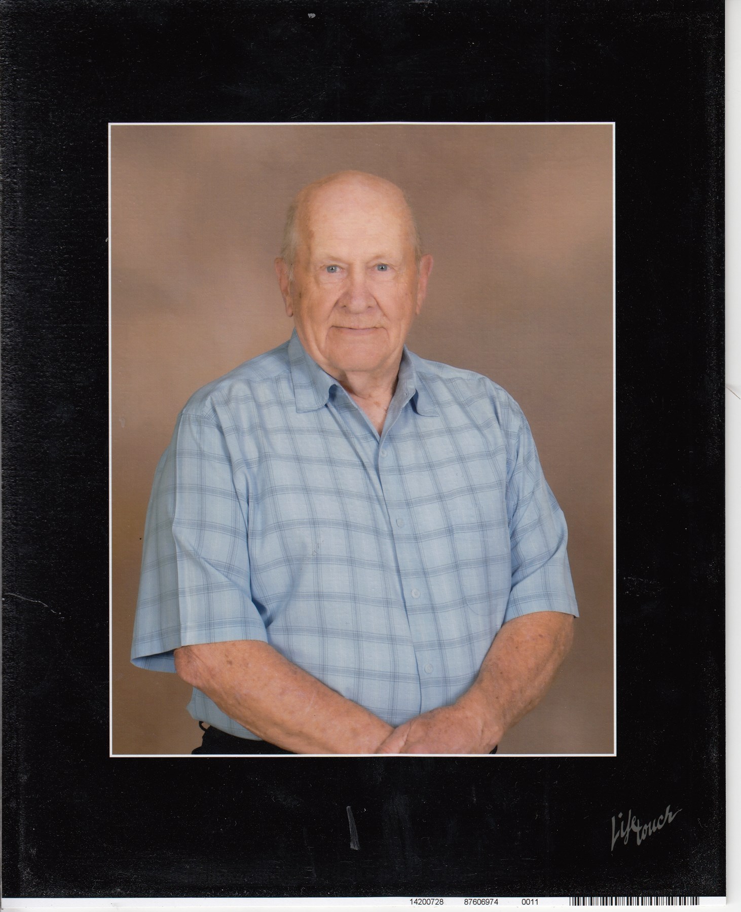 Obituary of Charles E. Leach