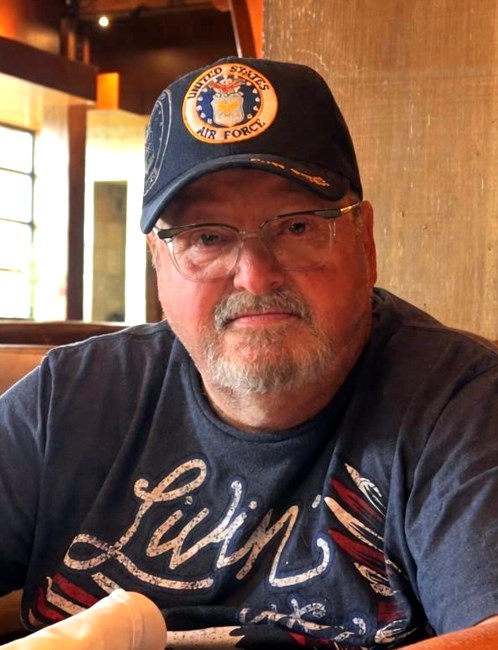 Obituary of John Spencer