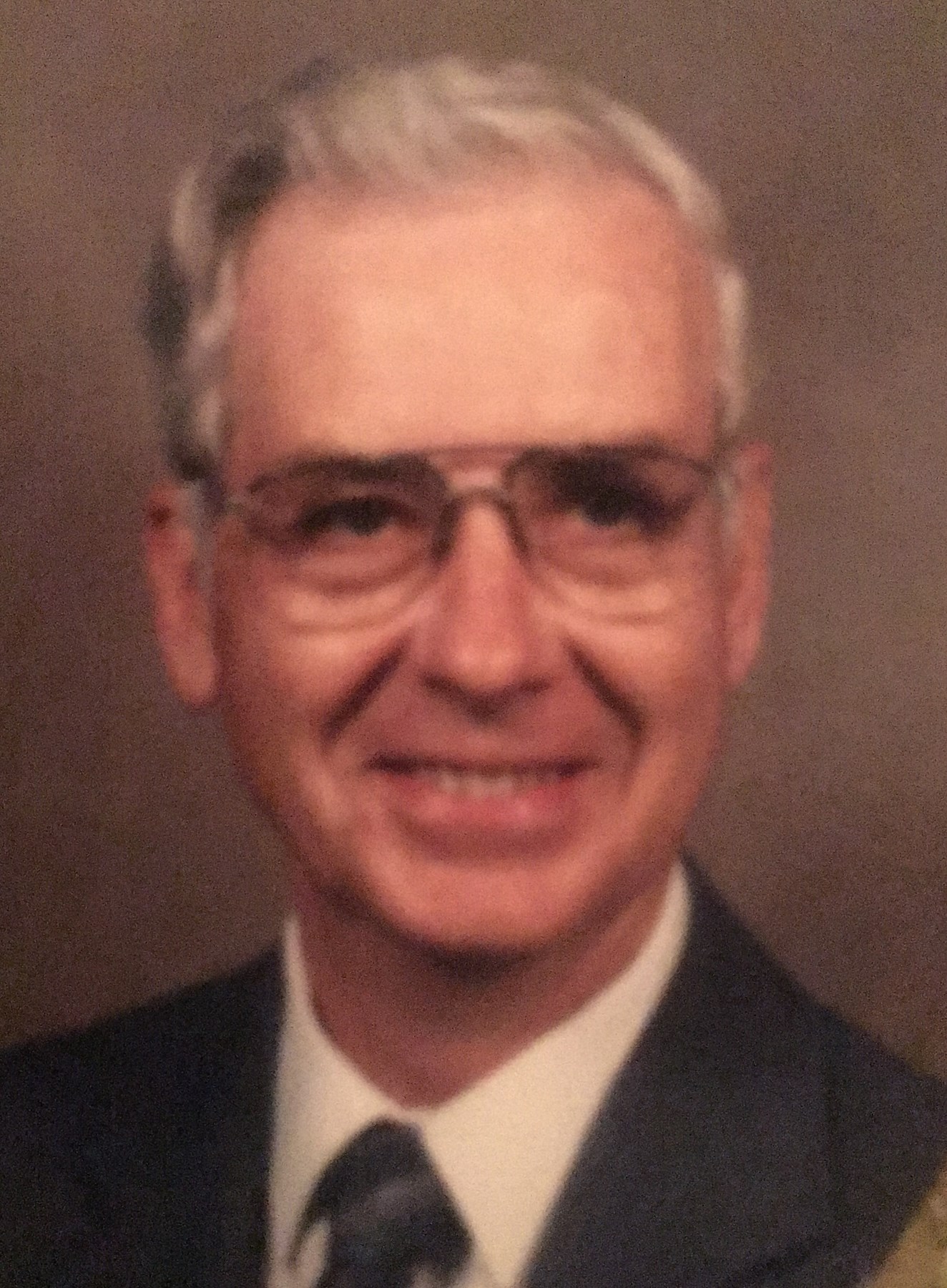 Obituary of Odus E. Tate