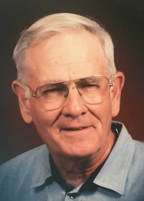 Obituary of John D.E. Barnett